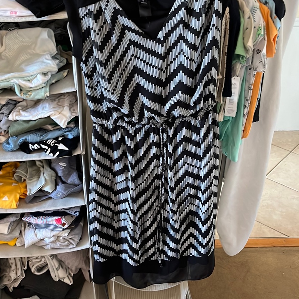 Black and white dress it is comfortable and light! Size 4